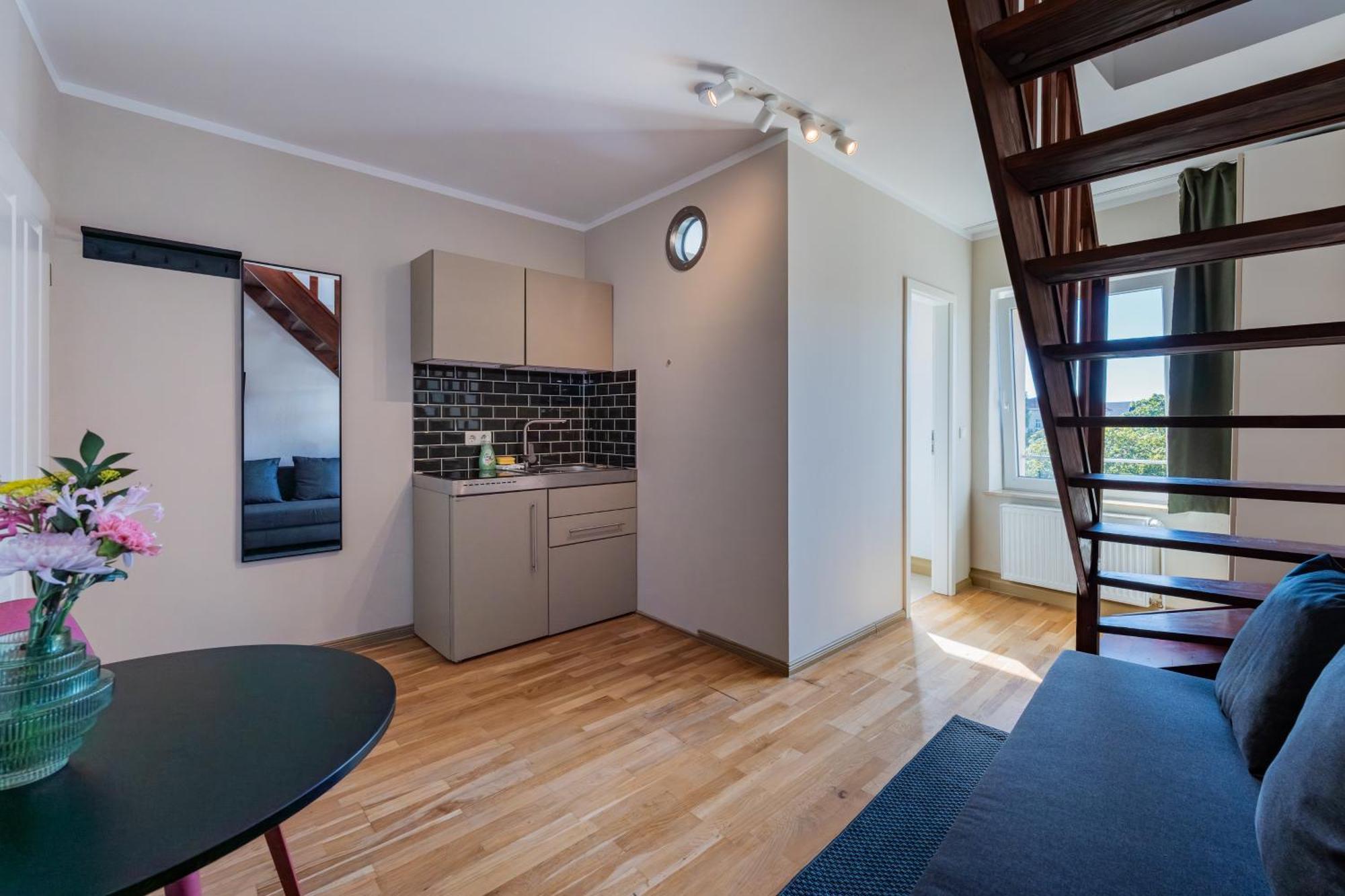 & Aparthotel